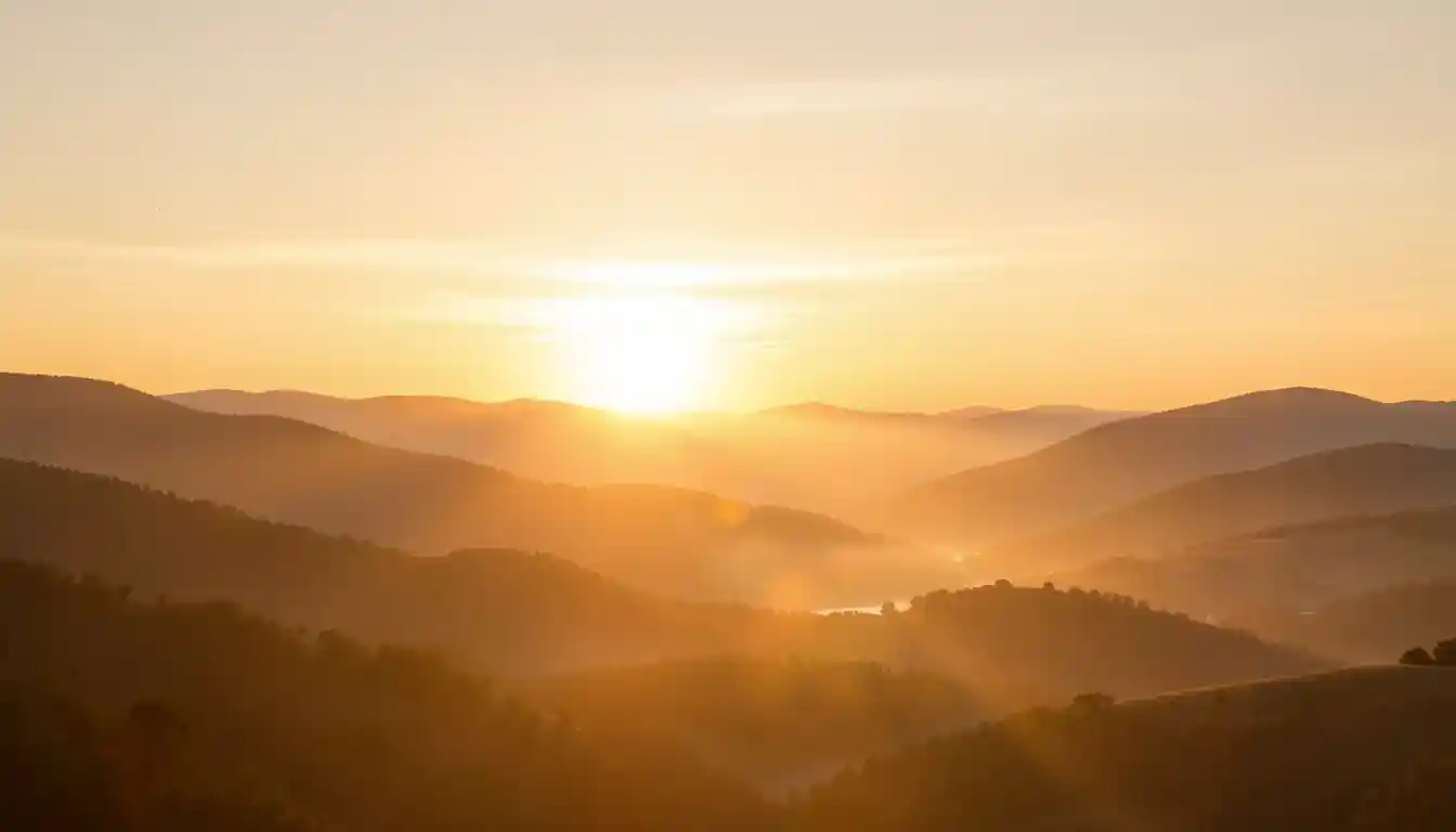 Abstract dawn landscape with warm golden light symbolising a new habit journey